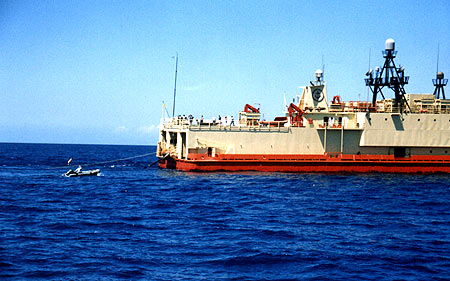 We are in the small boat waiving the American flag.